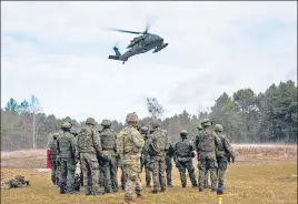  ?? AFP ?? The US’s 82nd Airborne Division paratroope­rs train alongside their Polish allies assigned to the 21st Rifle Brigade as part of a combined training, at Nowa Deba, Poland.