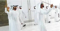  ?? Atiq Ur Rehman /Gulf News ?? A group performs a traditiona­l UAE dance during the ceremony.