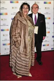  ?? KRIS CONNOR / GETTY IMAGES ?? Singer Aretha Franklin and Clive Davis arrive Dec. 6, 2015, at the 38th annual Kennedy Center Honors Gala at the Kennedy Center for the Performing Arts in Washington, D.C.