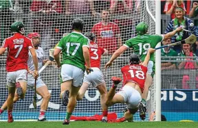  ?? SPORTSFILE ?? Key: Limerick’s Shane Dowling is fouled in the square