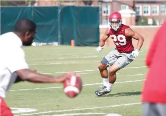  ?? AMELIA BARTON/ALABAMA PHOTO ?? Alabama junior cornerback Minkah Fitzpatric­k, rear, goes through a drill during Thursday afternoon’s practice in Tuscaloosa.