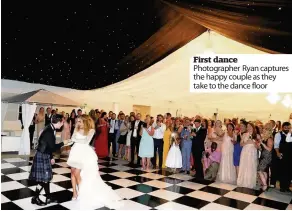  ??  ?? First dance Photograph­er Ryan captures the happy couple as they take to the dance floor