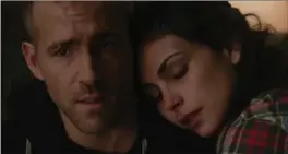  ?? HANDOUT, TNS ?? Ryan Reynolds and Morena Baccarin in “Deadpool.”