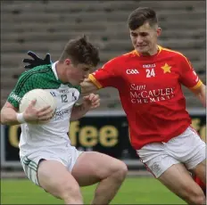  ??  ?? Aaron Dobbs (Starlights) tackles Jamie Myler (St. James’) in the Tom Doyle Supplies SFC quarter-final in Innovate Wexford Park on Saturday.