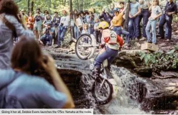  ??  ?? Giving it her all, Debbie Evans launches the 175cc Yamaha at the rocks.