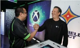  ?? Photograph: Casey Rodgers/AP ?? Phil Spencer, right, Head of Xbox, interacts with fans during a meet and greet at the 2023 Xbox FanFest on Sunday, June 11, 2023 in Los Angeles