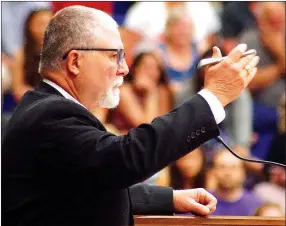  ??  ?? Randy Barrett, superinten­dent of Gentry Public Schools, addressed the students and guests during the 2017 Gentry High School graduation ceremonies in Siloam Springs on Sunday.