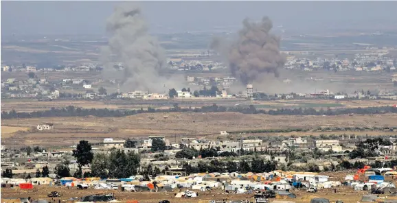  ?? Photo: EPA ?? Smoke rises as a result of Russian airstrikes on the Syrian side of the Golan Heights.
