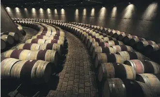  ?? ALEJANDRO PAGNI/AFP/ GETTY IMAGES ?? #16 French and American oak wine barrels