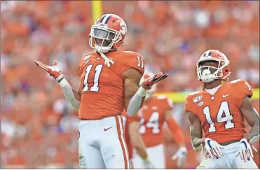  ?? Ap-richard Shiro, File ?? Clemson’s Isaiah Simmons (11) and Denzel Johnson react after making a defensive play during the first half of an NCAA college football game against Florida State, in Clemson, S.C. on Oct. 12. Simmons was selected to The Associated Press All-atlantic Coast Conference football team, and named Defensive Player of the Year on Tuesday, Dec. 10.