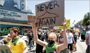  ?? ASSOCIATED PRESS ?? Anastasia Panidis, 17, joins several hundred abortion rights protesters marching through the Mission District on May 14 in San Francisco.