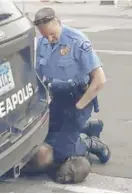  ?? DARNELLA FRAZIER VIA AP ?? In this video image, a Minneapoli­s police officer kneels on the neck of a handcuffed man who was pleading that he could not breathe in Minneapoli­s.