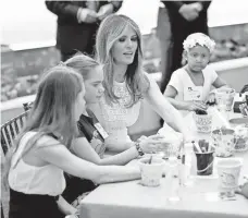  ?? WIN MCNAMEE, GETTY IMAGES ?? First lady Melania Trump works on an art project at the Children’s National Health System in Washington on April 28.