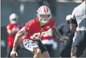  ?? RANDY VAZQUEZ — BAY AREA NEWS GROUP ?? The San Francisco 49ers’ George Kittle (85) runs to make a block during a drill at practice at Levi’s Stadium in Santa Clara on Sunday.