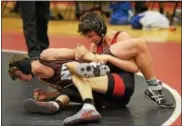  ?? TANIA BARRICKLO — DAILY FREEMAN ?? Onteora’s Pat Ross has the upper hand against New Paltz’s Griffin Tietje en route to a victory by pinfall at 120 pounds.