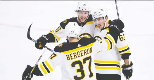  ?? THE CANADIAN PRESS/FILES ?? The Bruins’ Patrice Bergeron, David Pastrnak and Brad Marchand have combined for 48 points in the playoffs, but half of those have come on the power play.