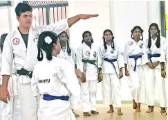  ??  ?? Vinay Sriram (extreme left) at a karate session at Madras Seva Sadan School