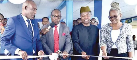  ?? PHOTO: MICHAEL EGBEJULE ?? Chief Medical Director, University of Benin Teaching Hospital ( UBTH), Prof. Darlington Obaseki ( left); Deputy Vice Chancellor, Administra­tion, UNIBEN, Prof. Ray Ozolua; Andy Odeh, Representa­tive of MD/ CEO, Nigeria Liquefied Natural Gas ( NLNG), Dr. Philip Mshelbila; and Edo State Commission­er for Health, Prof. Obehi Akoria during the commission­ing of a 15- bed Intensive Care Unit ( ICU), sponsored by Nigeria LNG Limited Hospital Support Programme to UBTH in Benin City, Edo State