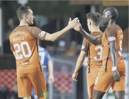  ??  ?? Patrick N’koyi celebrates his second goal with team-mate and fellow Dutchman Jordie Briels at Tannadice last night. Inset below, United boss Ray Mckinnon.