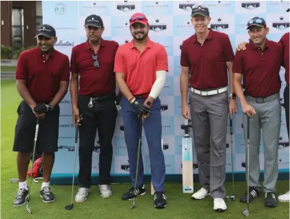  ??  ?? Former cricketers Mahela Jayawarden­e ( from left), Kapil Dev, Murali Kartik, Shaun Pollock and Ajit Agarkar at the Louis Philippe Celebrity Pro- Am in Bengaluru on Saturday.
