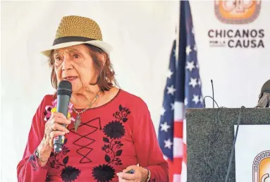  ?? MEGAN MENDOZA/THE REPUBLIC ?? Dolores Huerta speaks at an event hosted by Chicanos Por La Causa honoring the 50th anniversar­y of the United Farm Workers’ hunger strike at the original location of Santa Rita Hall on May 13 in Phoenix.
