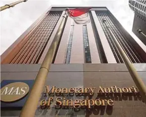  ?? REUTERS PIC ?? The Monetary Authority of Singapore says it has intensifie­d its supervisio­n of financial institutio­ns that have high risk of money laundering.