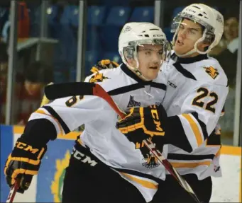  ?? T.J. COLELLO - CAPE BRETON ?? Sudbury, Ont., native Jacob Smith of the Cape Breton Screaming Eagles, right, has taken the long road to play for his Quebec Major Junior Hockey League team, but says the adversity he's faced has only made him stronger.