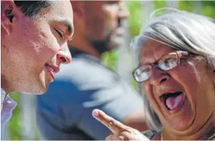  ??  ?? Castro meets with Playita community leader Lucie Rivera during an event with San Juan Mayor Carmen Yulín Cruz. Castro spoke about increasing Latino representa­tion to take on Trump.