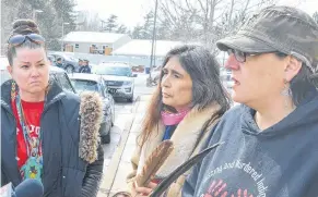  ?? FRANCIS CAMPBELL/FILE PHOTO ?? Michelle Paul, left, Darlene Gilbert and Madonna Bernard stand outside the RCMP detachment in Enfield in this April photo. Gilbert and Bernard were arrested at the Alton Gas work site next to Shubenacad­ie River.