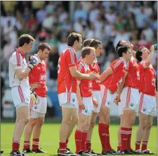  ??  ?? The Louth players prepare for the national anthem prior to the Longford game.