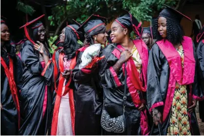  ?? Photograph: Esther Ruth Mbabazi ?? ‘I felt compelled to capture their optimism.’ Students graduating from the VIP Academy for Aviation and Technology in Juba, South Sudan, during the civil war.