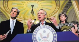  ?? Alex Brandon ?? The Associated Press Harry Reid, center, and John Kerry, left, who served in the U.S. Senate together, will appear together again as part of the inaugural Harry Reid Public Engagement Lecture Series.