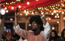  ?? ?? A Sudanese refugee attends a Sudanese cultural event during the Muslim holy fasting month of Ramadan, in Cairo.