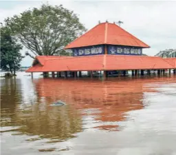  ?? ?? A FLOODED SHIVA TEMPLE in Aluva near Kochi in August 2022.