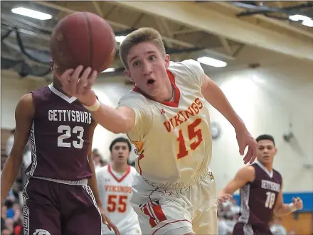  ?? PETE BANNAN — MEDIANEWS GROUP ?? West Chester East’s Andrew Carr saves a ball from going out of bounds in the second quarter against Gettysburg in state playoff action at Norristown Area High School Friday night.