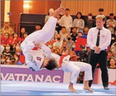  ?? HONG MENEA ?? Cambodian athletes perform in the men’s ju-jitsu demonstrat­ion event at the 32nd SEA Games, held in Cambodia in May 2023.