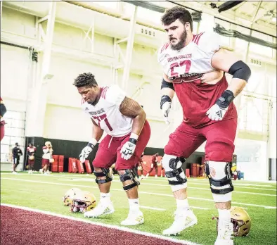  ?? @BCFootball / ?? New Canaan's Jack Conley (67) takes part in a preseason practice with the Boston College football team in August, 2020.