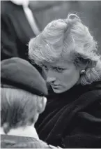  ??  ?? Princess Diana visiting Enniskille­n with Prince Charles in the wake of the 1987 bomb