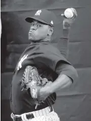  ?? LYNNE SLADKY AP ?? Luis Severino, who went 19-8 last season, throws in the Yankees’ bullpen Friday during a spring training workout after avoiding his arbitratio­n hearing.