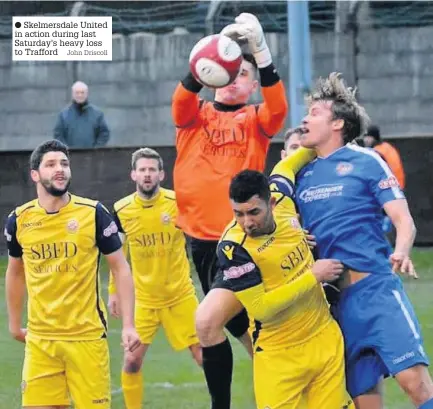  ?? Skelmersda­le United in action during last Saturday’s heavy loss to Trafford John Driscoll ??