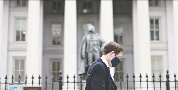  ?? ANDREW HARRER/BLOOMBERG ?? Some are concerned the central banks’ interventi­ons as a response to COVID-19 are distorting markets. Above, the U.S. Treasury Building in Washington.