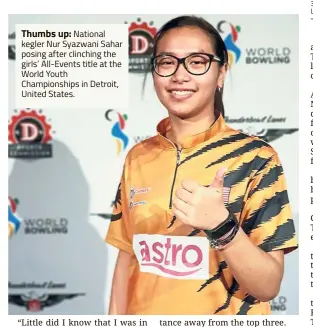  ??  ?? Thumbs up: National kegler Nur Syazwani Sahar posing after clinching the girls’ All-Events title at the World Youth Championsh­ips in Detroit, United States.