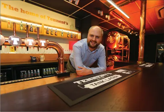  ?? Pictures: Colin Mearns ?? Alan McGarrie, Tennent’s brand director, in the bar where visitors end the tour