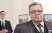  ?? BURHAN OZBILICI / THE ASSOCIATED PRESS ?? Andrey Karlov, the Russian ambassador to Turkey moments before an assassin shot him in the back.