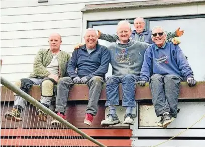  ?? ?? ●●Volunteers take a break from the work at Hazel Grove’s clubhouse