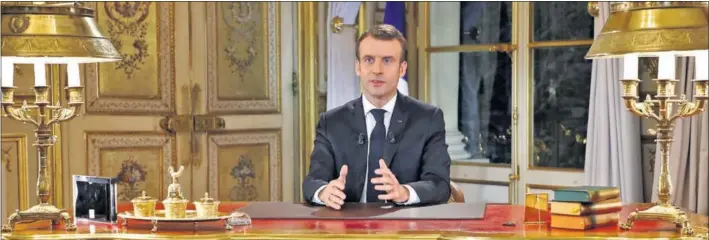 ?? / REUTERS ?? El presidente francés, Emmanuel Macron, durante su discurso a la nación, ayer en el Elíseo.