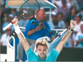  ?? THOMAS PETER / REUTERS ?? Switzerlan­d’s Stan Wawrinka rejoices after beating France’s Jo-Wilfried Tsonga in their Australian Open quarterfin­al match at Melbourne Park on Tuesday.