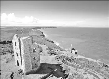  ??  ?? Photo shows a former tin mine on the Cornish cliffs.