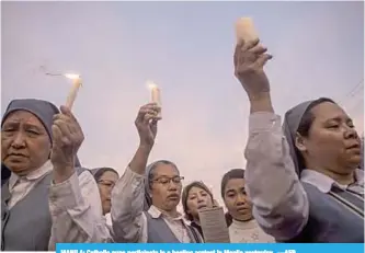  ?? —AFP ?? MANILA: Catholic nuns participat­e in a healing protest in Manila yesterday.