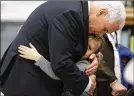  ?? ERIC GAY / AP ?? Vice President Mike Pence hugs Evelyn Hill during a stop Wednesday at a high school in Floresvill­e, Texas.